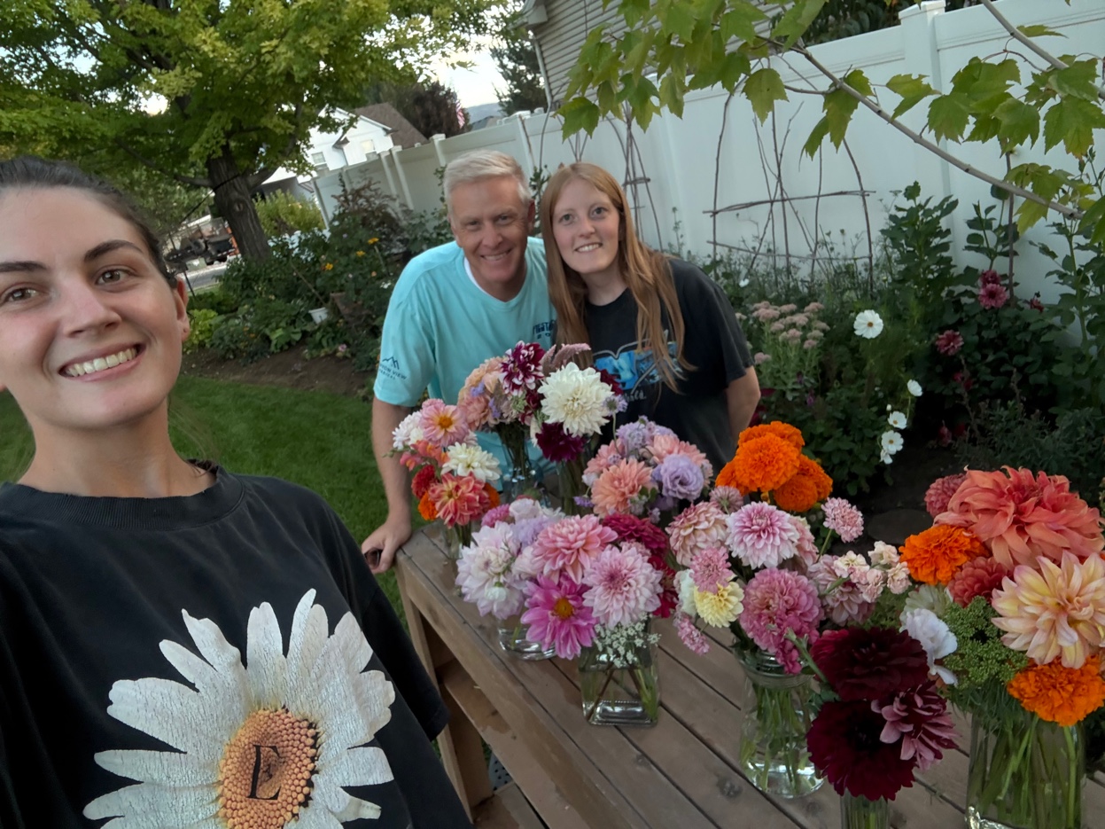 Ryan and daughters with Sunday arrangements